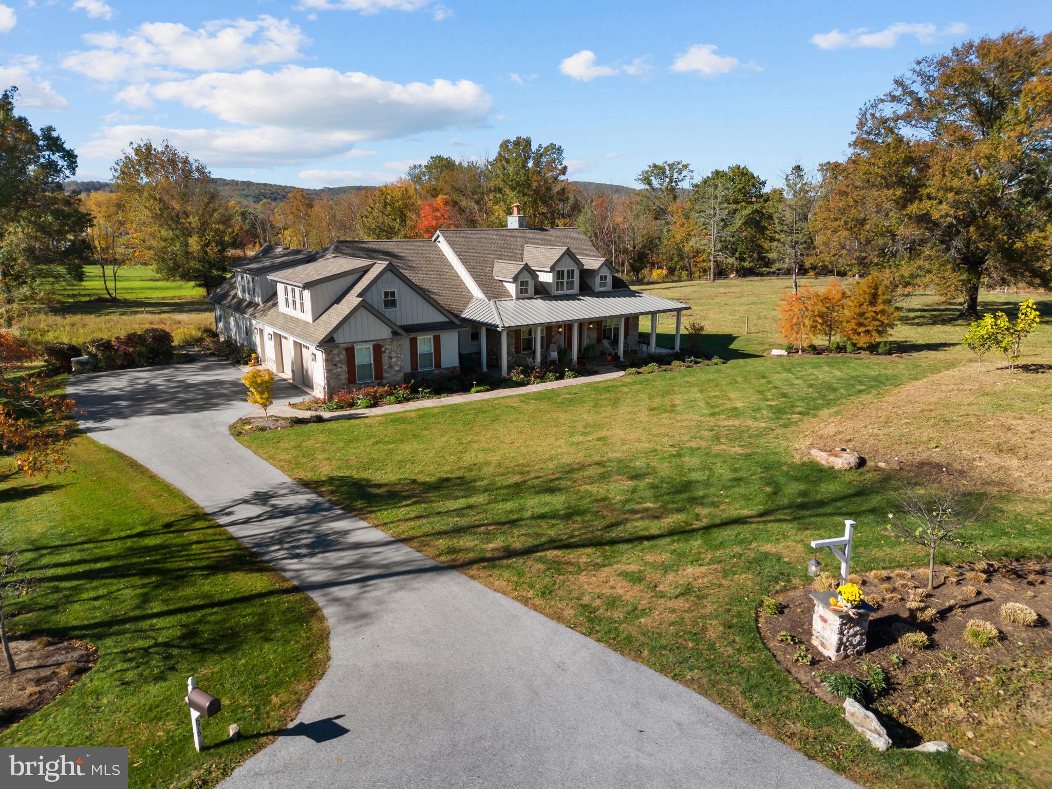 675 West Seven Stars Road Phoenixville, PA 19460 - Photo 3 of 45 an aerial view of a house with a yard and lake view