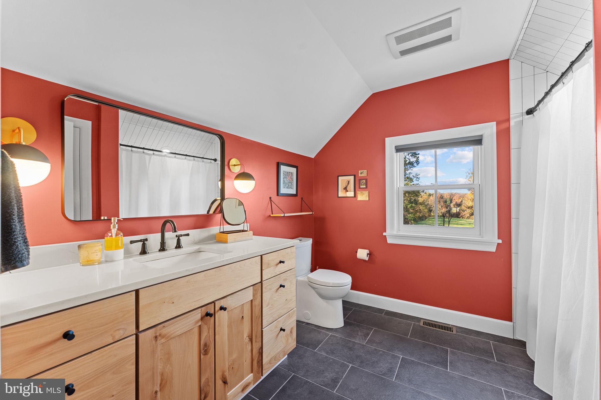675 West Seven Stars Road Phoenixville, PA 19460 - Photo 37 of 45 a bathroom with a toilet sink and mirror