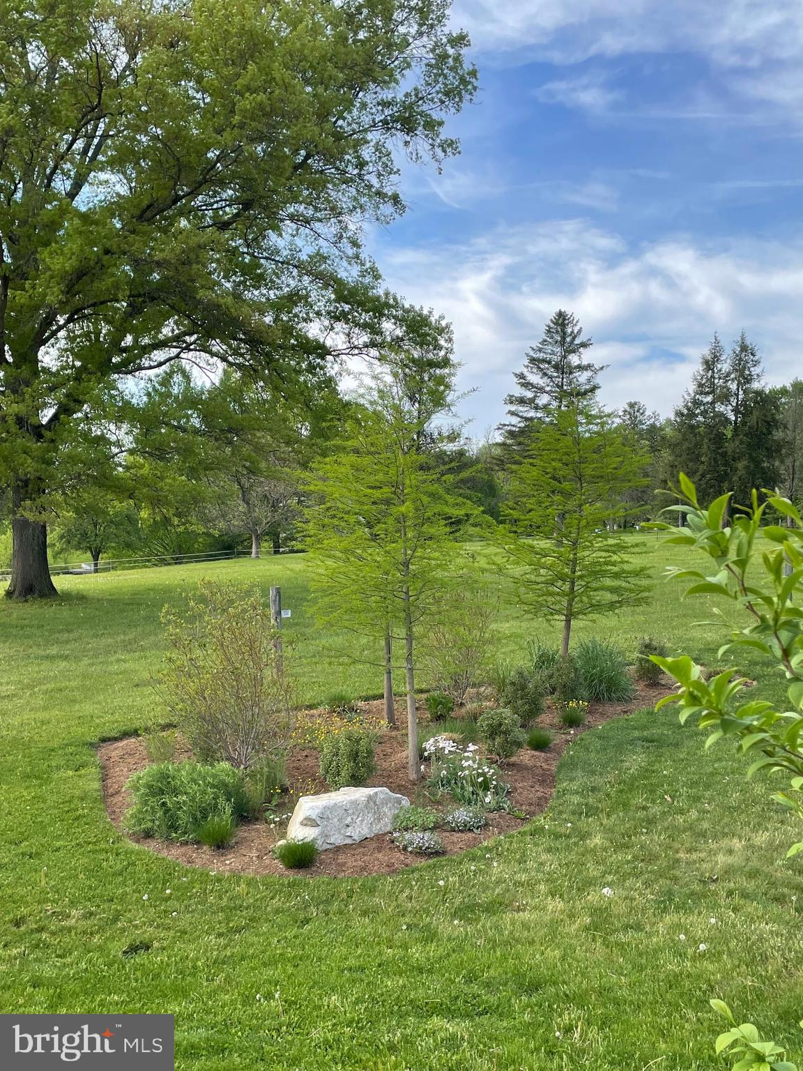 675 West Seven Stars Road Phoenixville, PA 19460 - Photo 40 of 45 a view of a garden with a lake