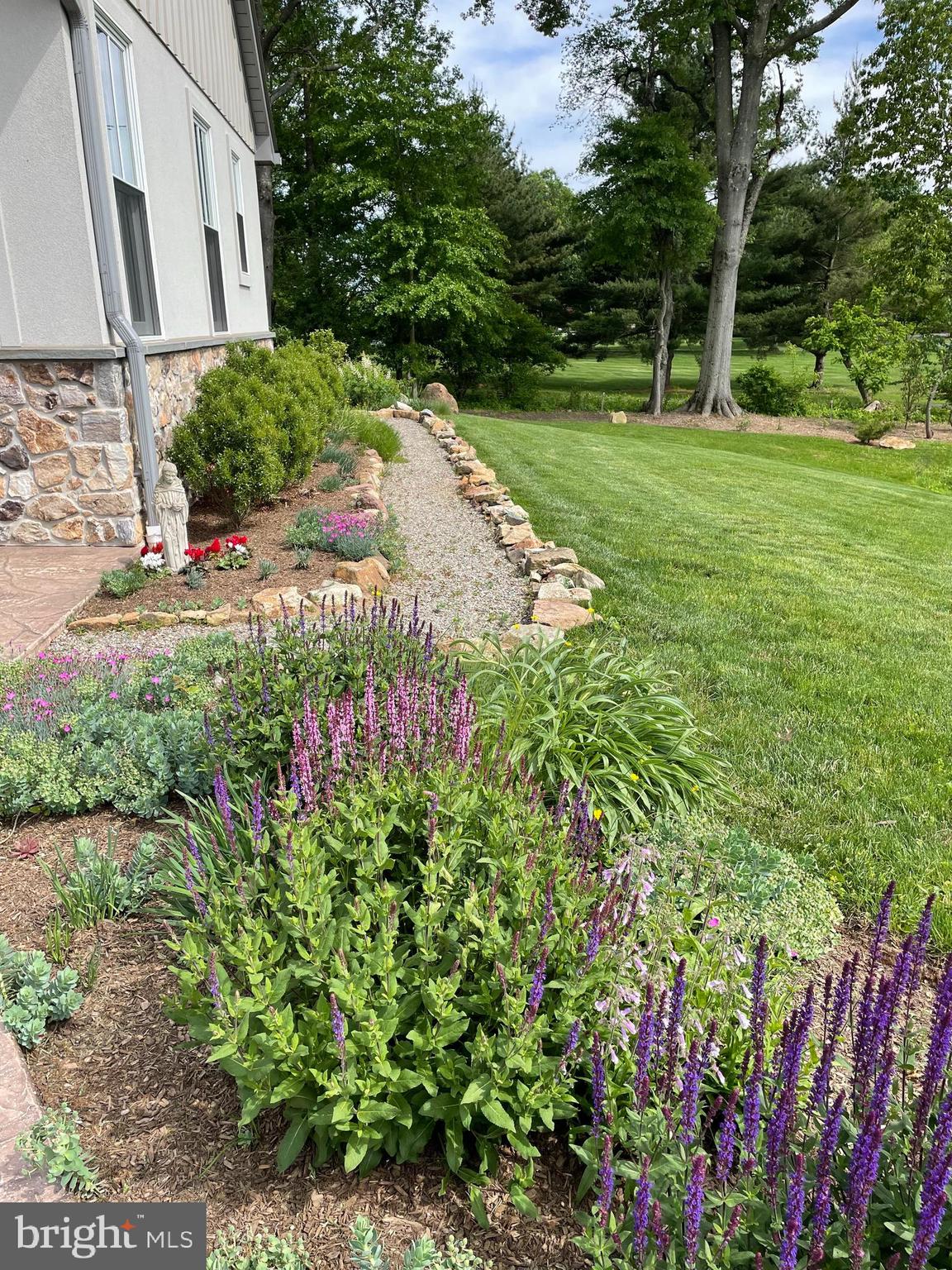 675 West Seven Stars Road Phoenixville, PA 19460 - Photo 44 of 45 a view of backyard with garden and trees