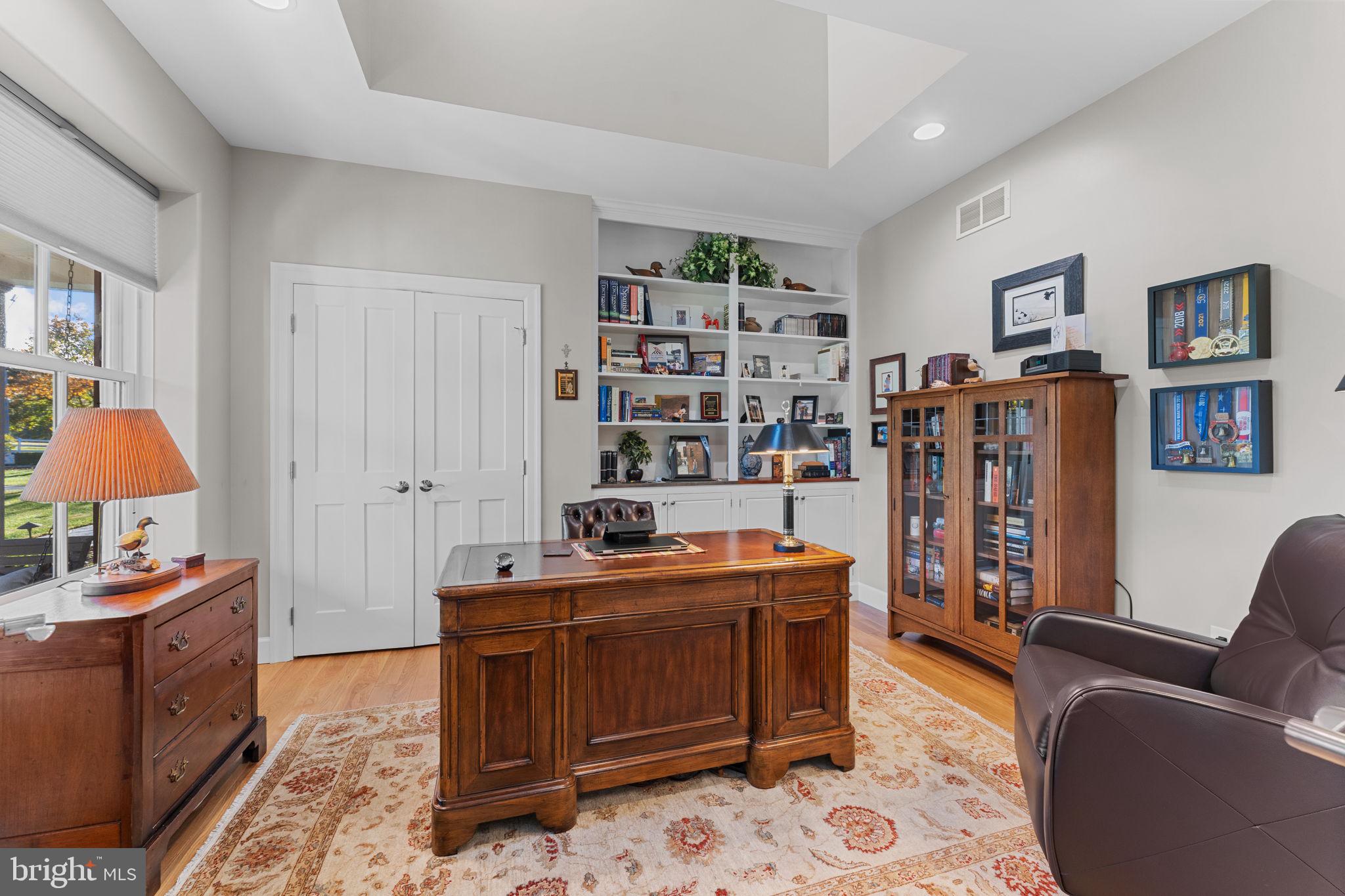 675 West Seven Stars Road Phoenixville, PA 19460 - Photo 6 of 45 a room with furniture a rug and a bookshelf