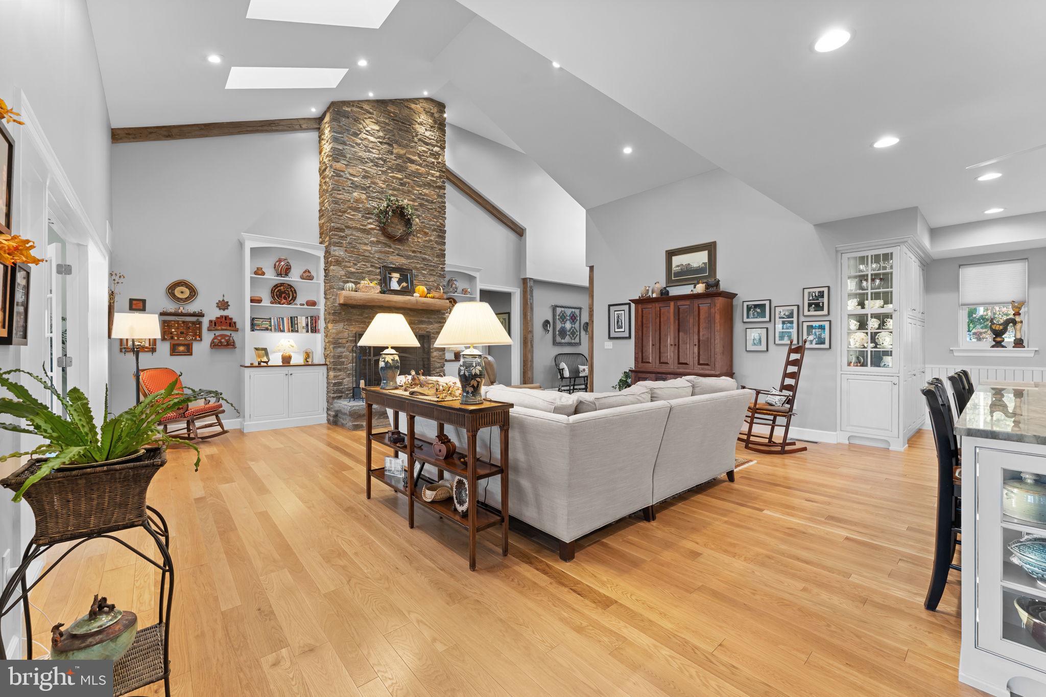 675 West Seven Stars Road Phoenixville, PA 19460 - Photo 7 of 45 a living room with furniture and a wooden floor