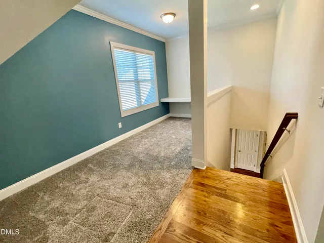 a workspace with furniture and a window