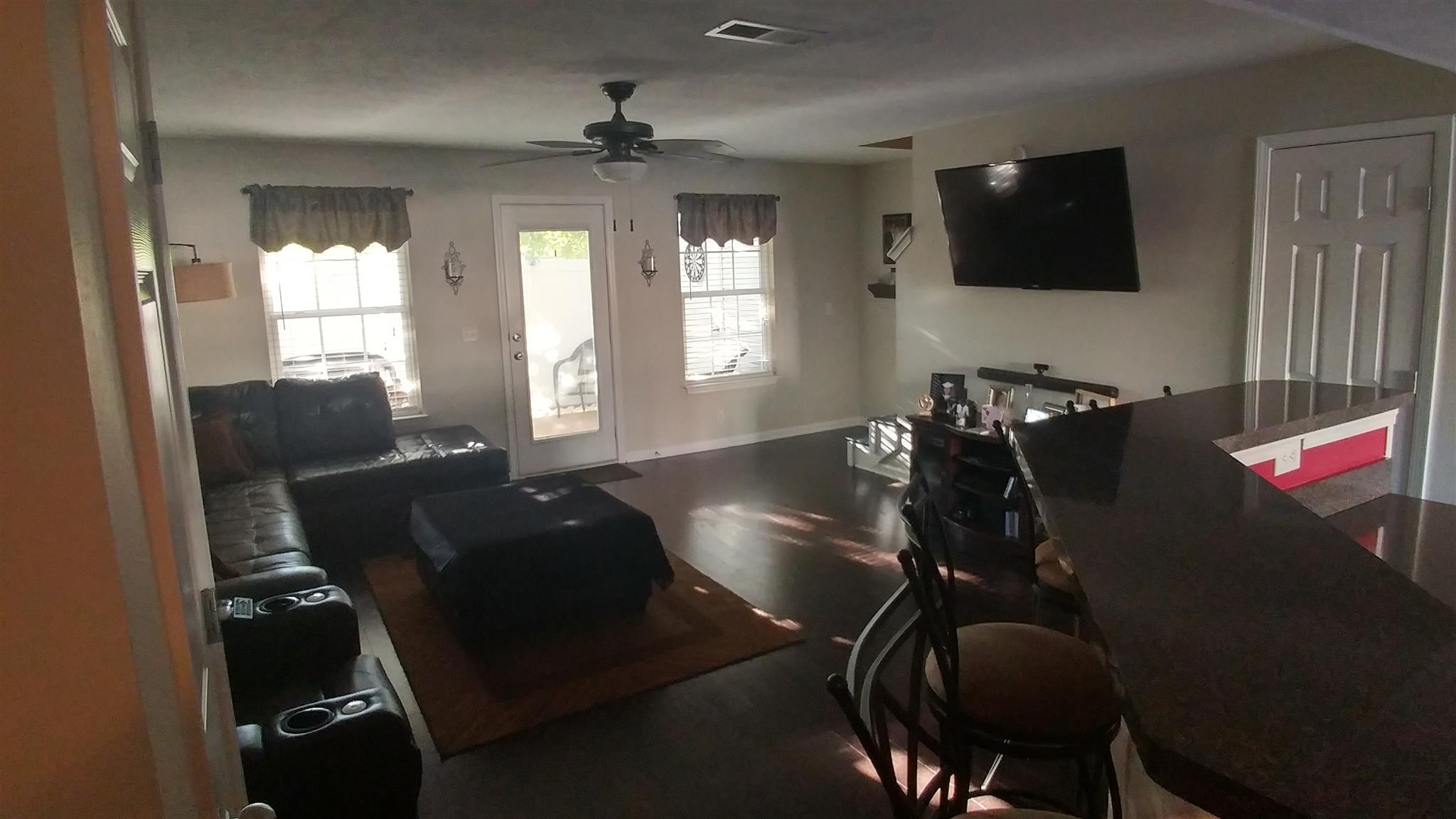 3023 London View Murfreesboro, TN 37128 - Photo 3 of 13 a living room with furniture and a flat screen tv