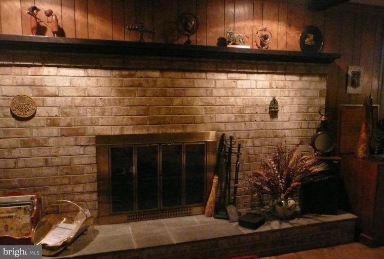 303 Springloch Road Silver Spring, MD 20904 - Photo 11 of 25 Brick Fireplace
