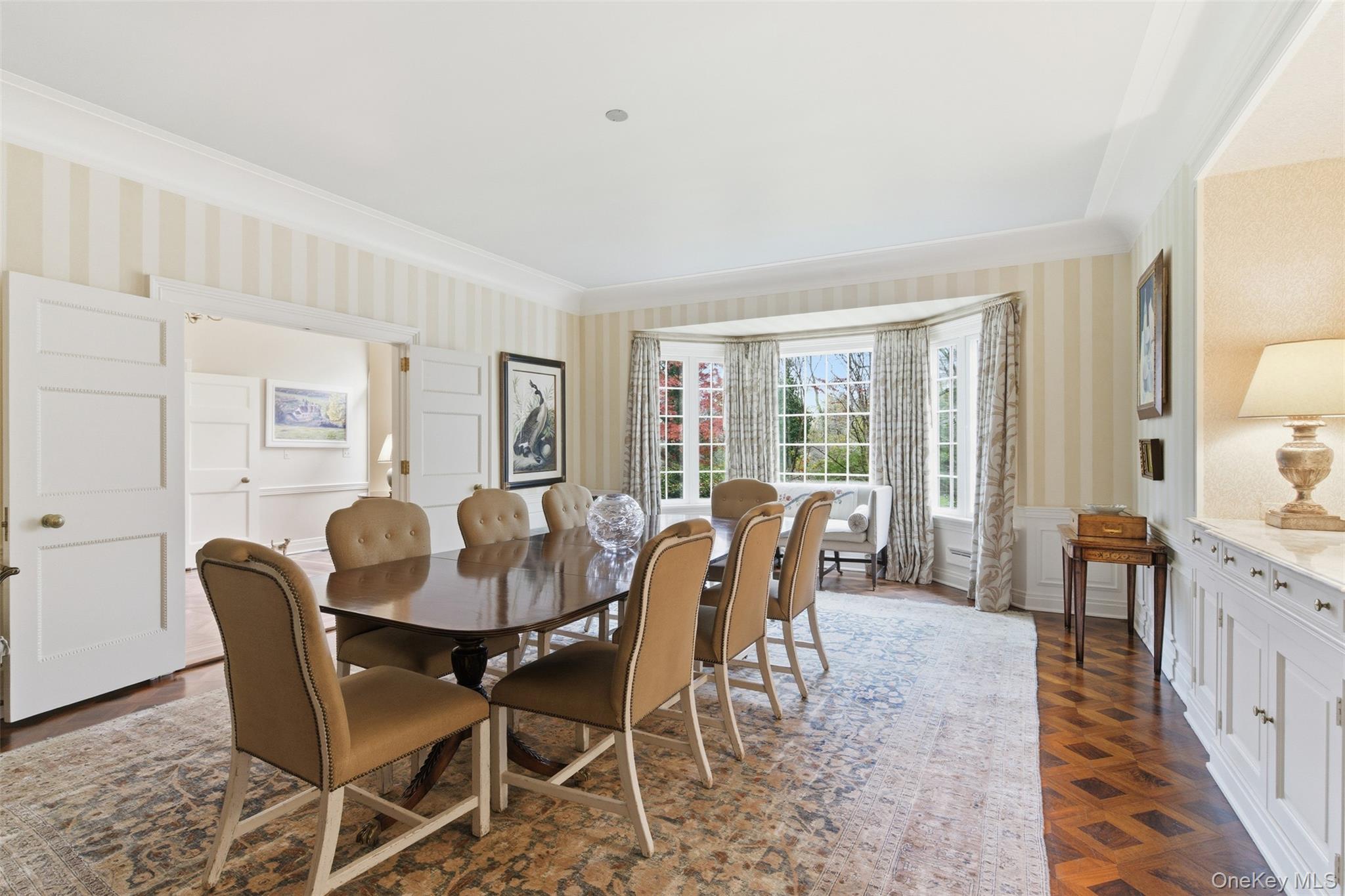 159 Factory Pond Road Mill Neck, NY 11560 - Photo 14 of 39 a view of a dining room with furniture and wooden floor