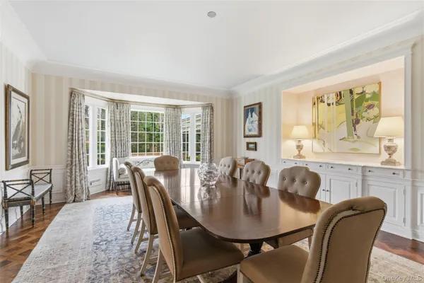 a view of a dining room with furniture window and outside view
