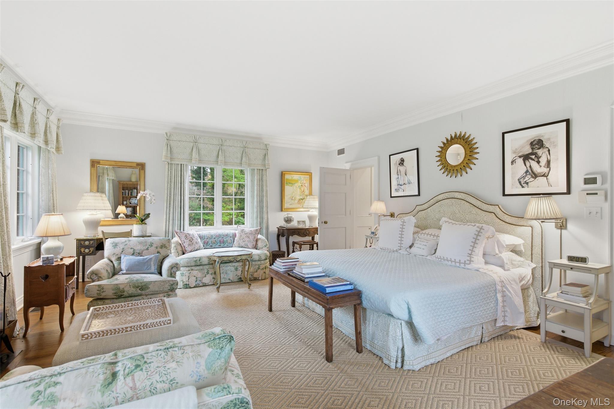 159 Factory Pond Road Mill Neck, NY 11560 - Photo 22 of 39 a spacious bedroom with a large bed couch and a window