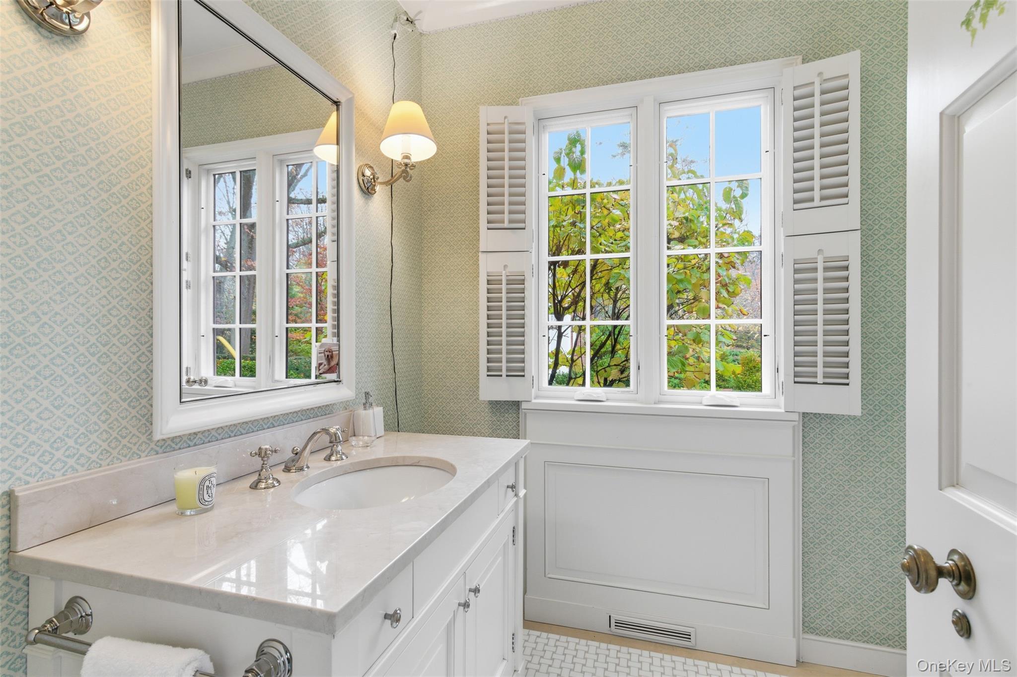 159 Factory Pond Road Mill Neck, NY 11560 - Photo 26 of 39 a bathroom with a sink and a mirror
