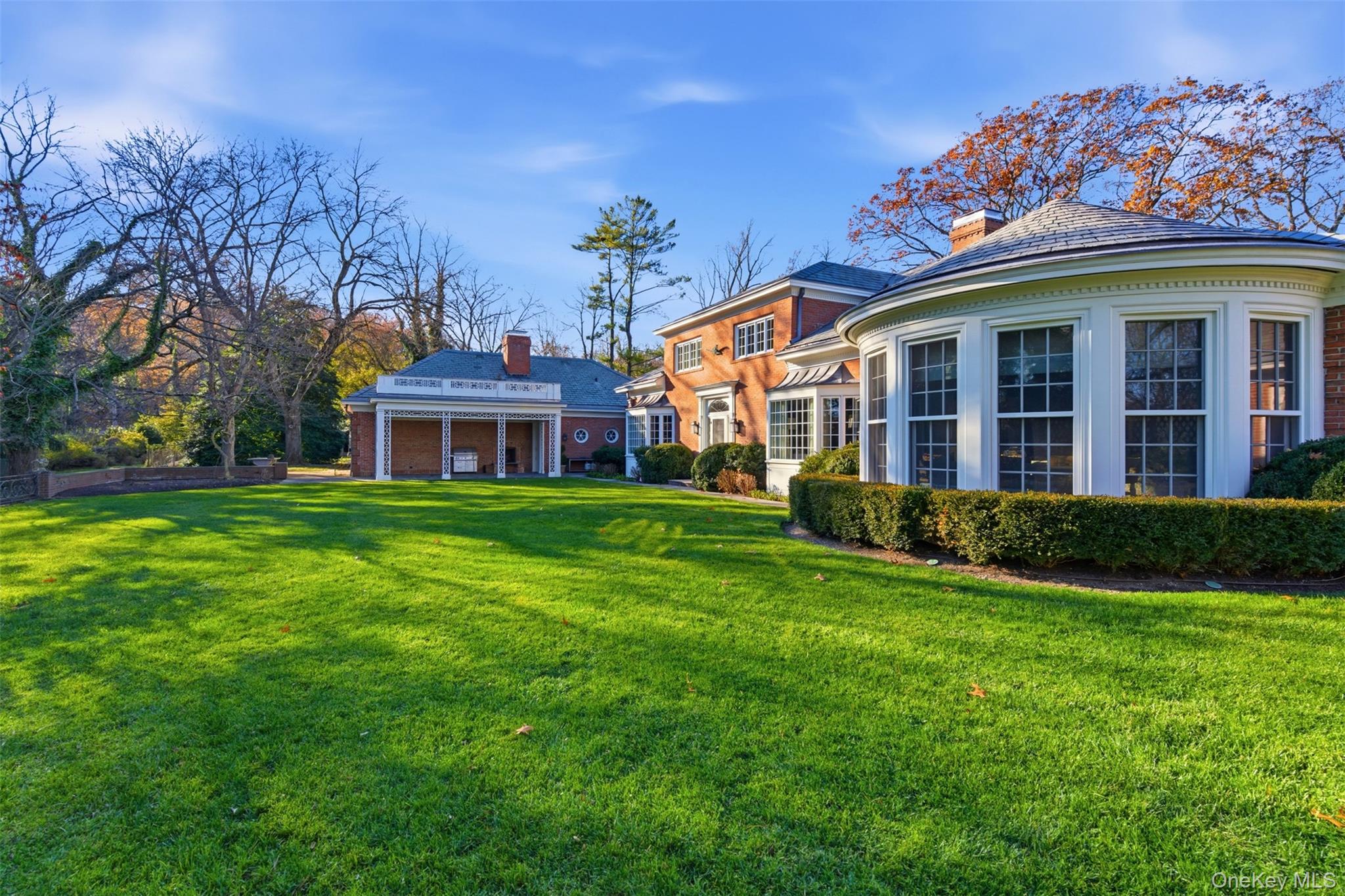 159 Factory Pond Road Mill Neck, NY 11560 - Photo 36 of 39 a front view of a house with garden