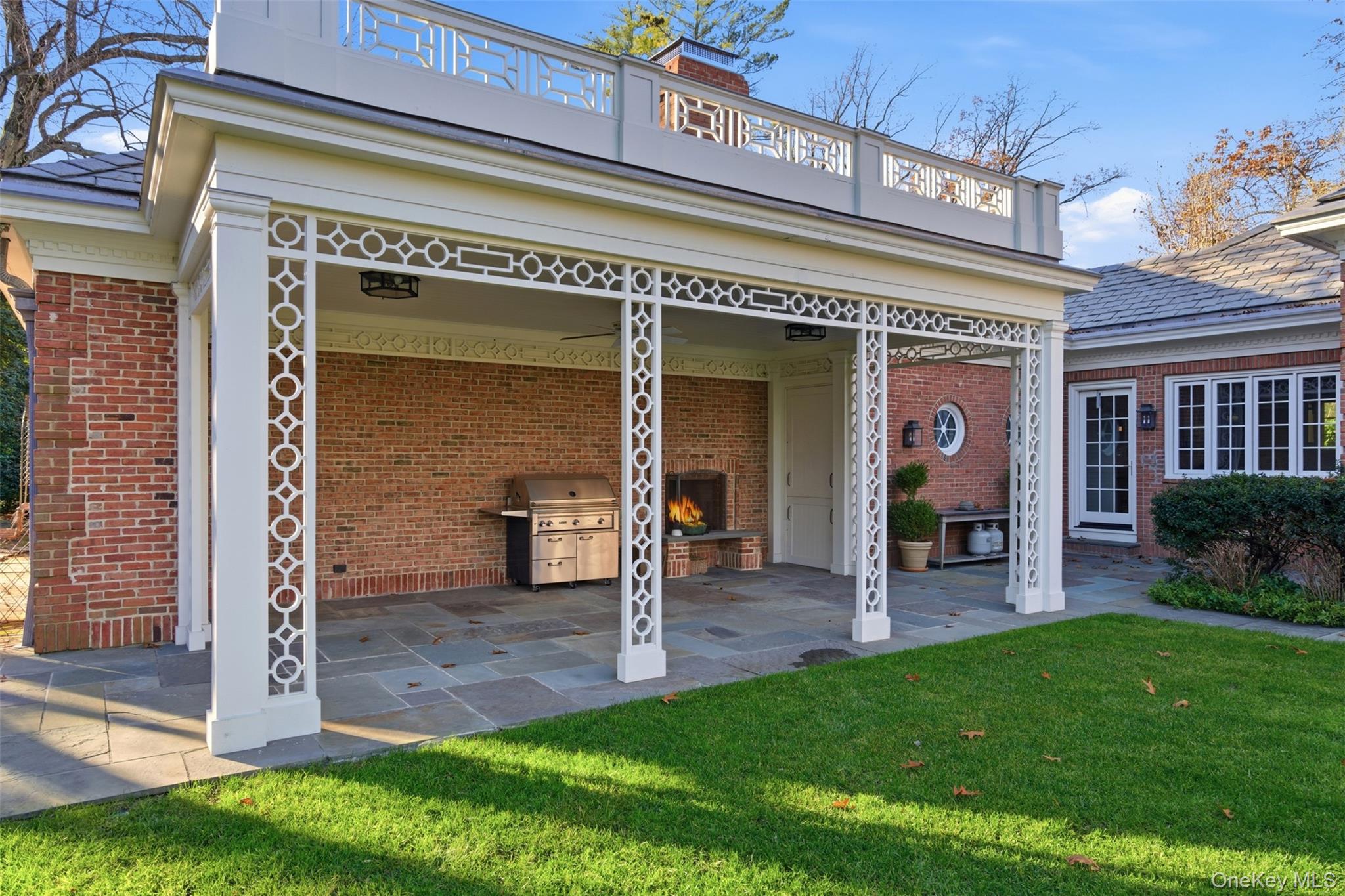 159 Factory Pond Road Mill Neck, NY 11560 - Photo 38 of 39 a view of a building with a outdoor space