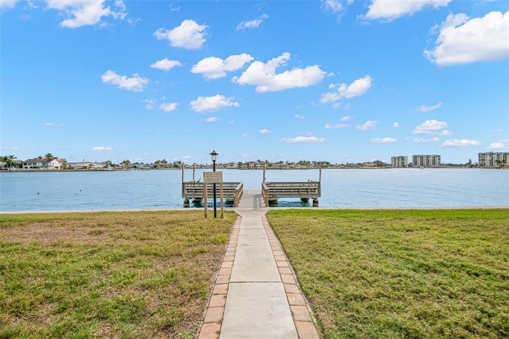 529 Sandy Hook Road Treasure Island, FL 33706 - Photo 43 of 55 a view of a swimming pool and an ocean