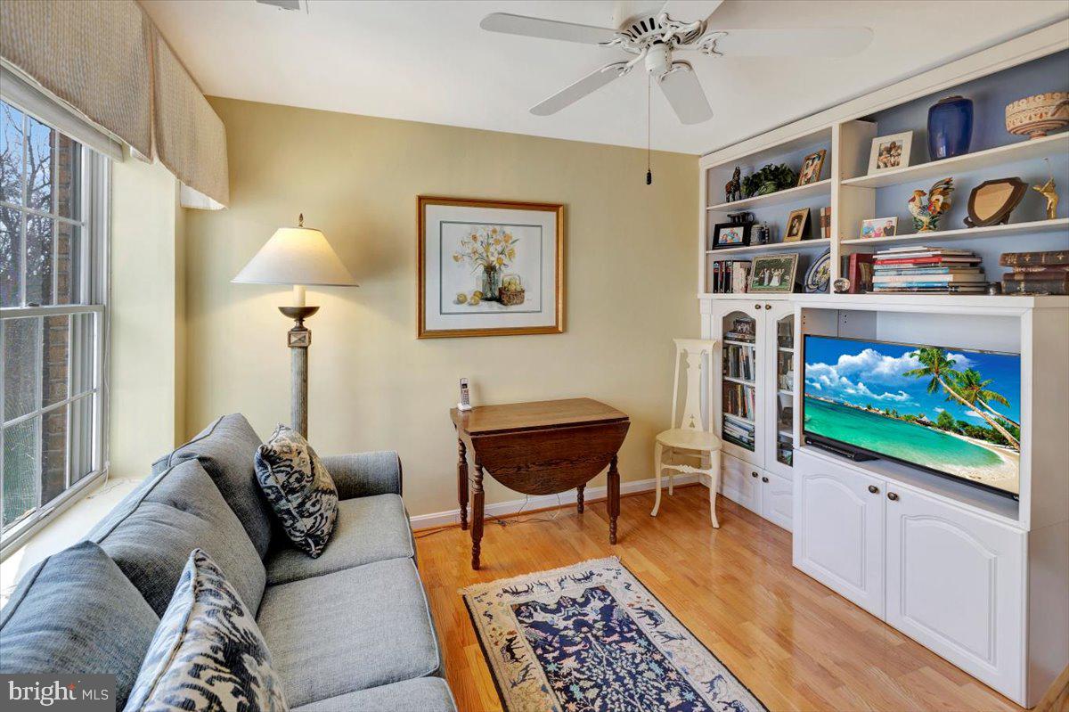 12320 Rosslare Ridge Road, Unit 306 Lutherville-Timonium, MD 21093 - Photo 32 of 41 Den with full wall book shelves