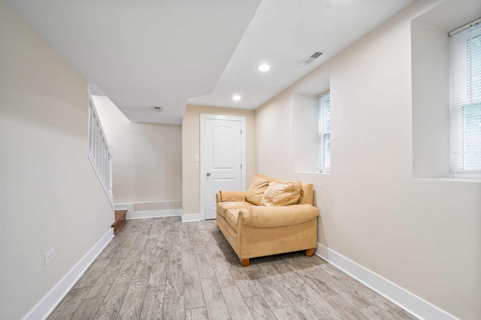 3755 Grove Street, Unit 1 Skokie, IL 60076 - Photo 15 of 24 a living room with furniture and a wooden floor