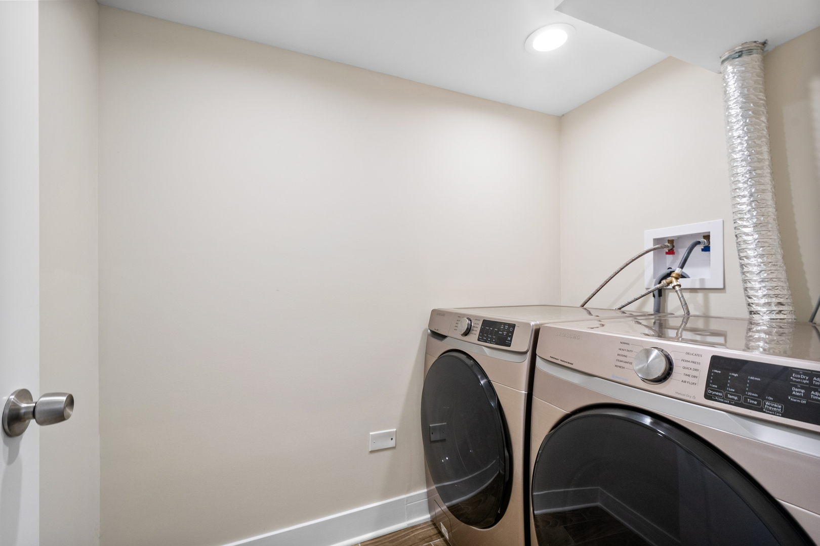 3755 Grove Street, Unit 1 Skokie, IL 60076 - Photo 20 of 24 a view of utility room with washer and dryer