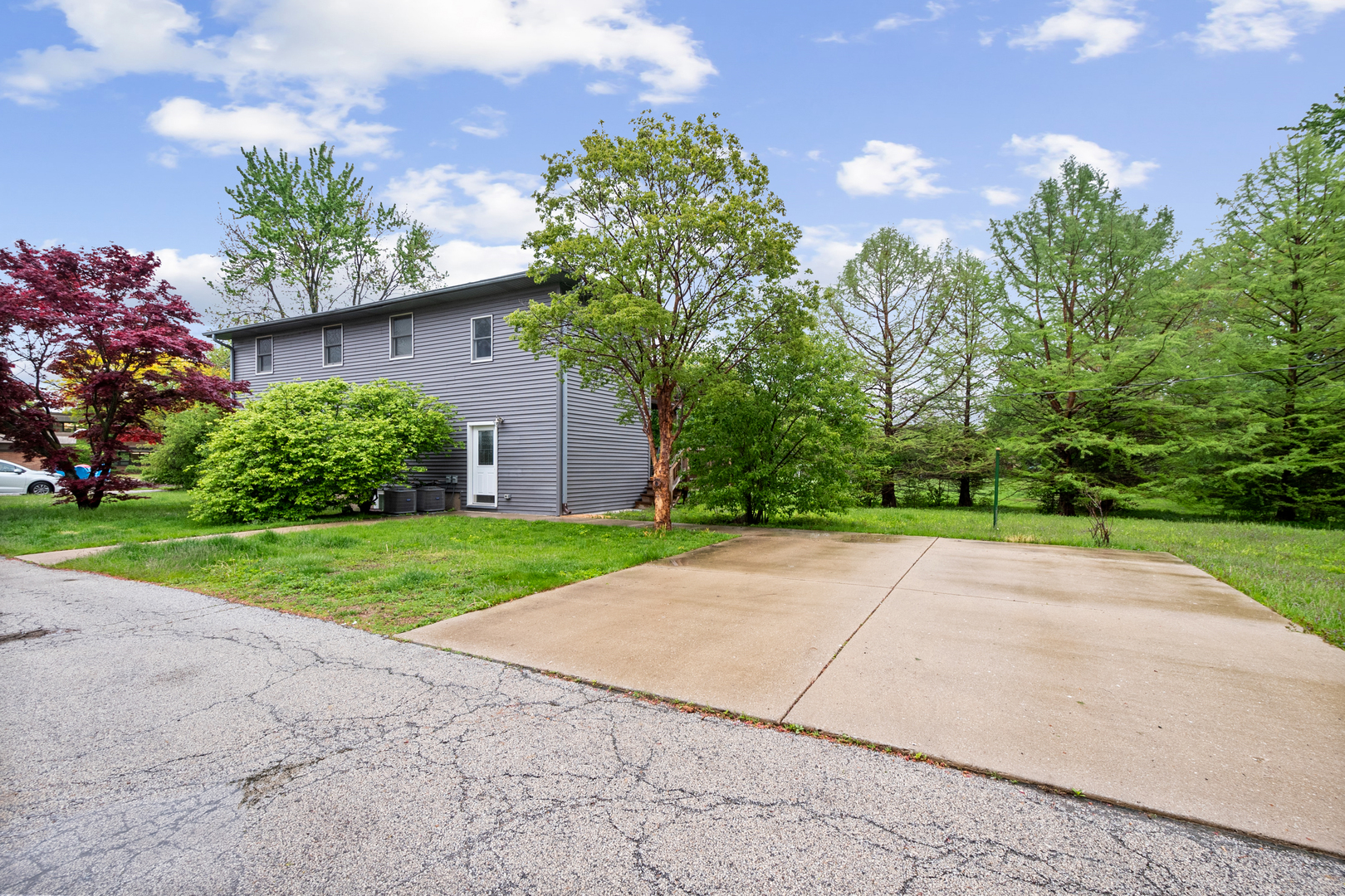 3755 Grove Street, Unit 1 Skokie, IL 60076 - Photo 2 of 24 a view of backyard of house with green space