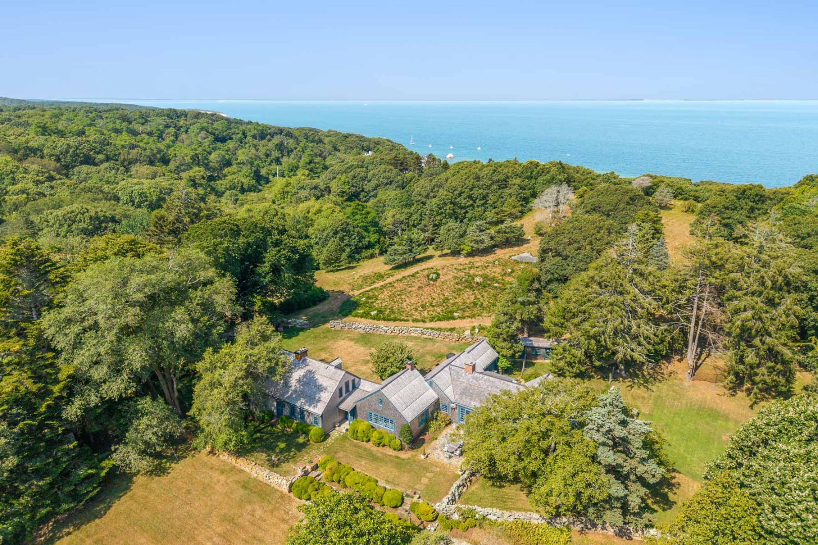 85 North Reservoir Road Vineyard Haven, MA 02568 - Photo 6 of 42 a view of an outdoor space and a yard