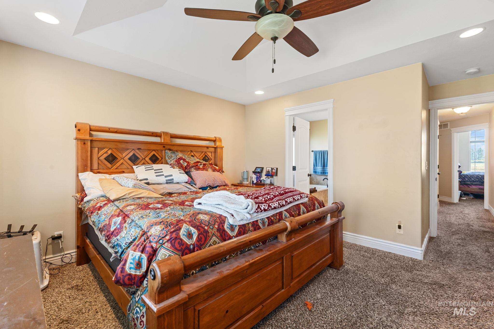 3625 North 2000 West Rexburg, ID 83440 - Photo 12 of 50 Carpeted bedroom featuring recessed lighting and ceiling fan