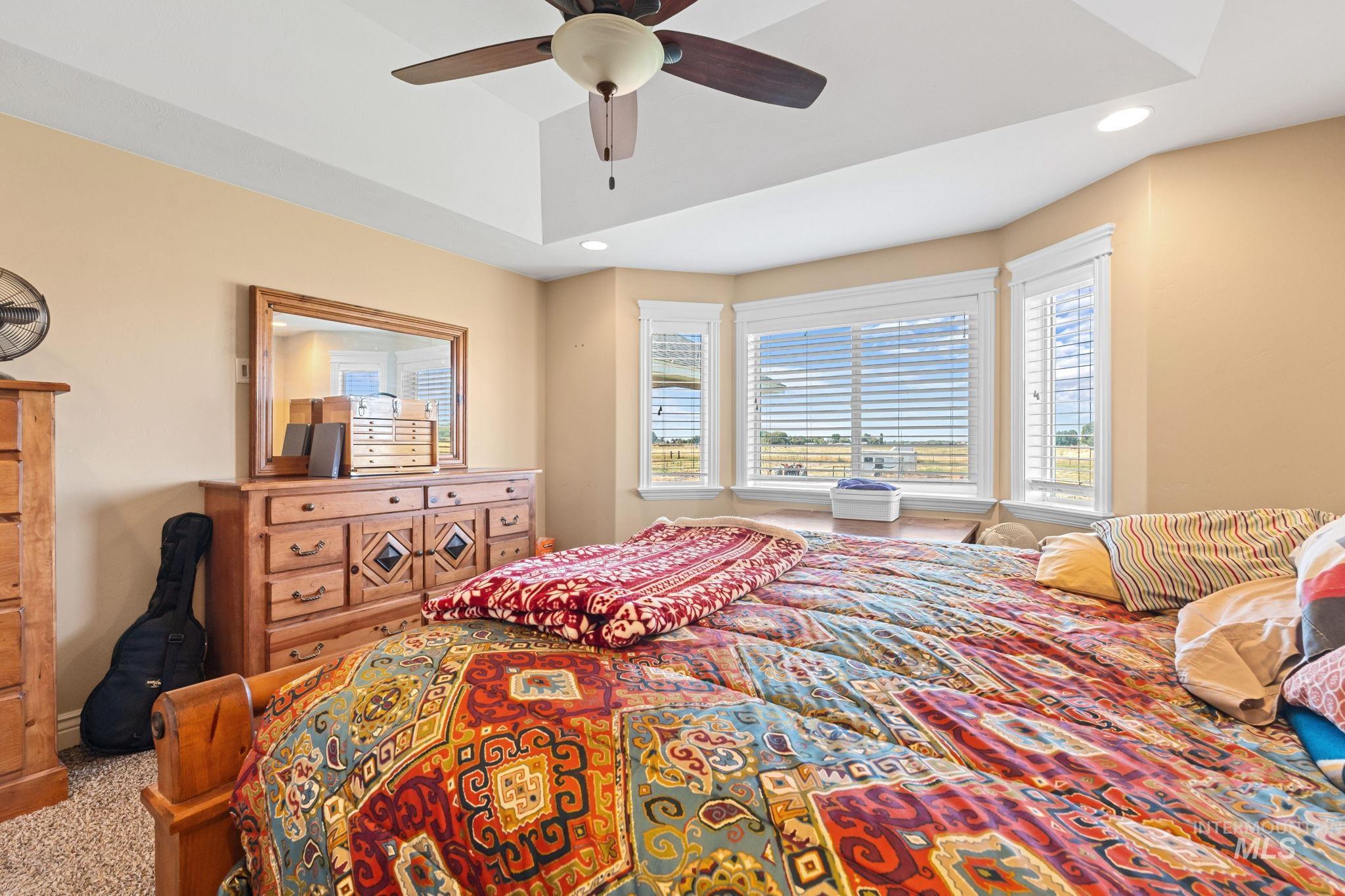 3625 North 2000 West Rexburg, ID 83440 - Photo 13 of 50 Carpeted bedroom with recessed lighting and ceiling fan