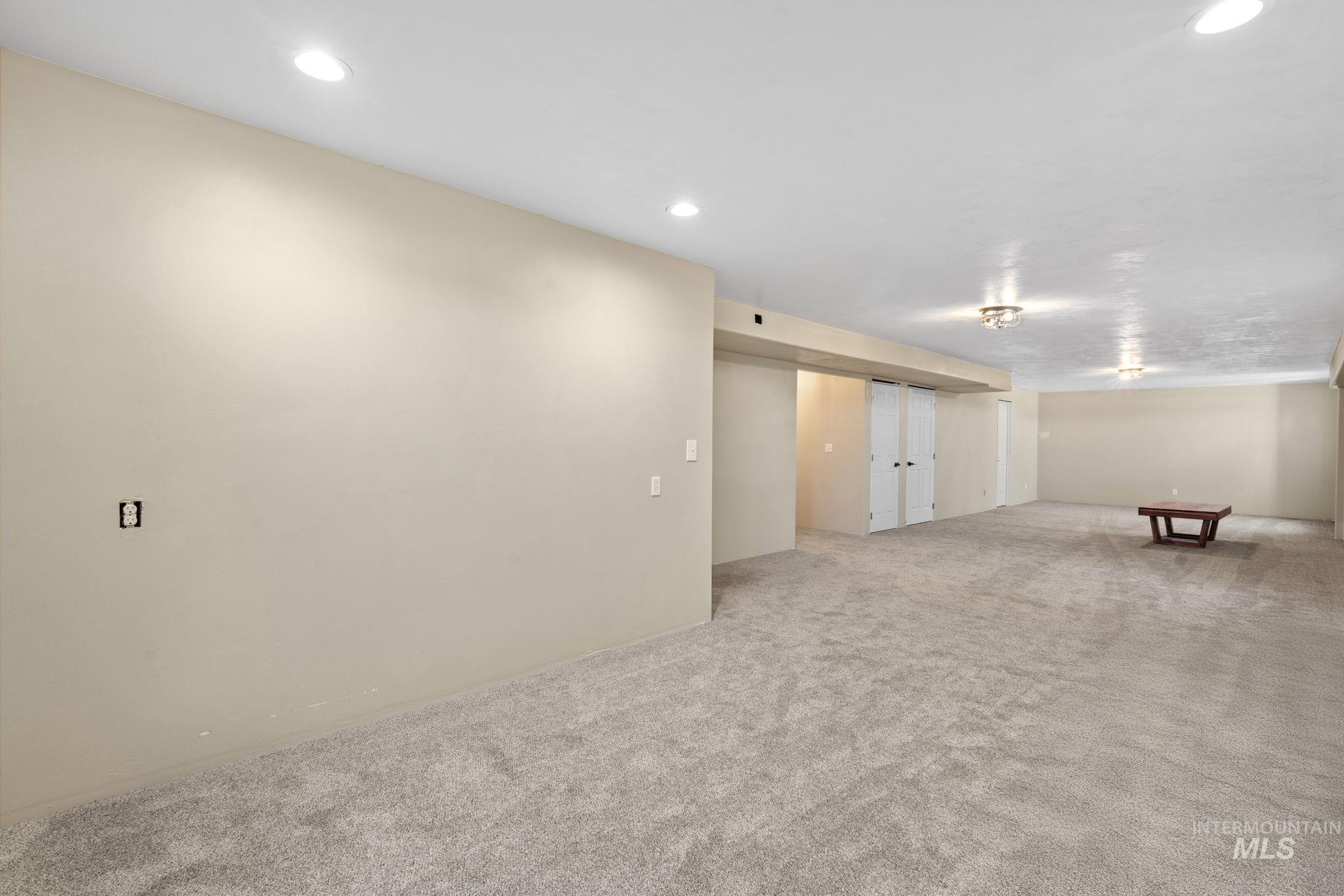 3625 North 2000 West Rexburg, ID 83440 - Photo 20 of 50 Finished basement featuring carpet floors and recessed lighting