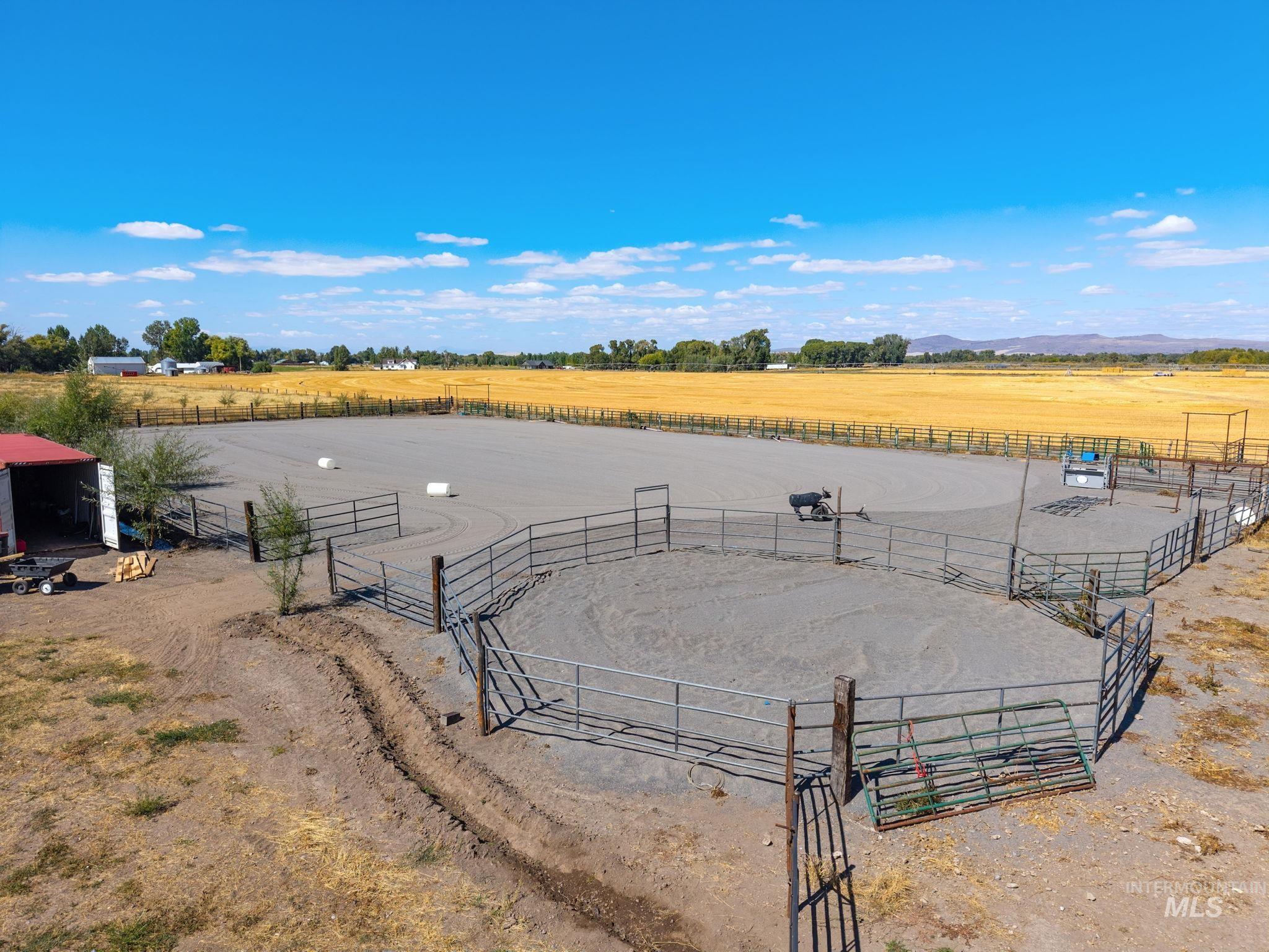 3625 North 2000 West Rexburg, ID 83440 - Photo 35 of 50 Water view with an enclosed riding area and rural landscape