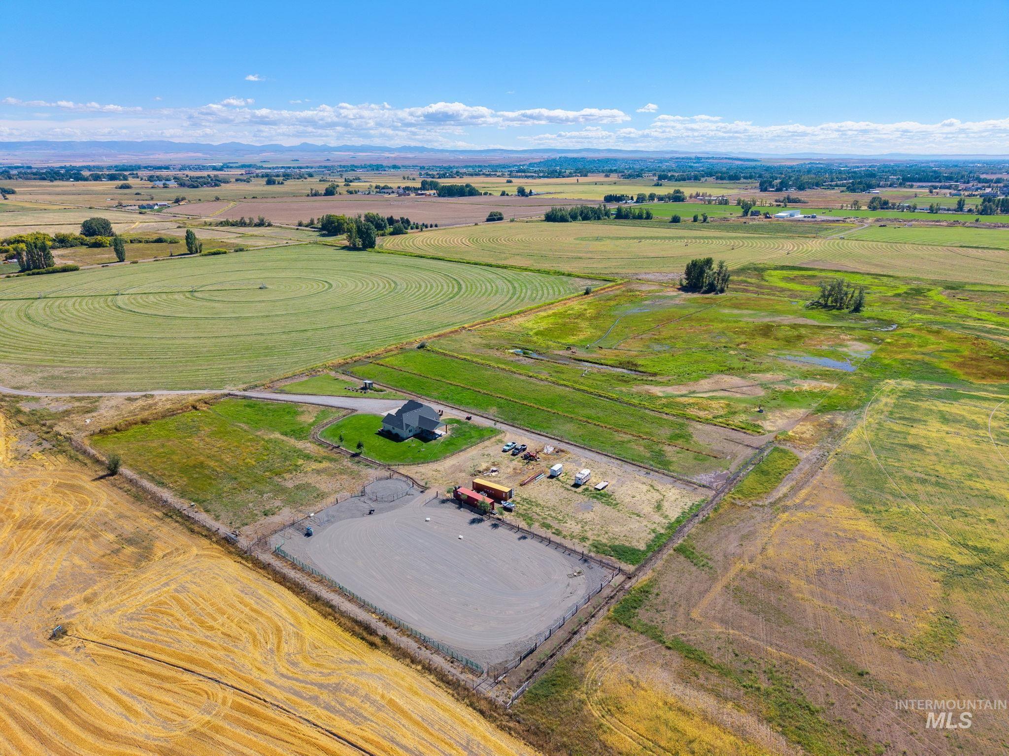 3625 North 2000 West Rexburg, ID 83440 - Photo 41 of 50 View of rural area featuring abundant farmland and a mountain backdrop
