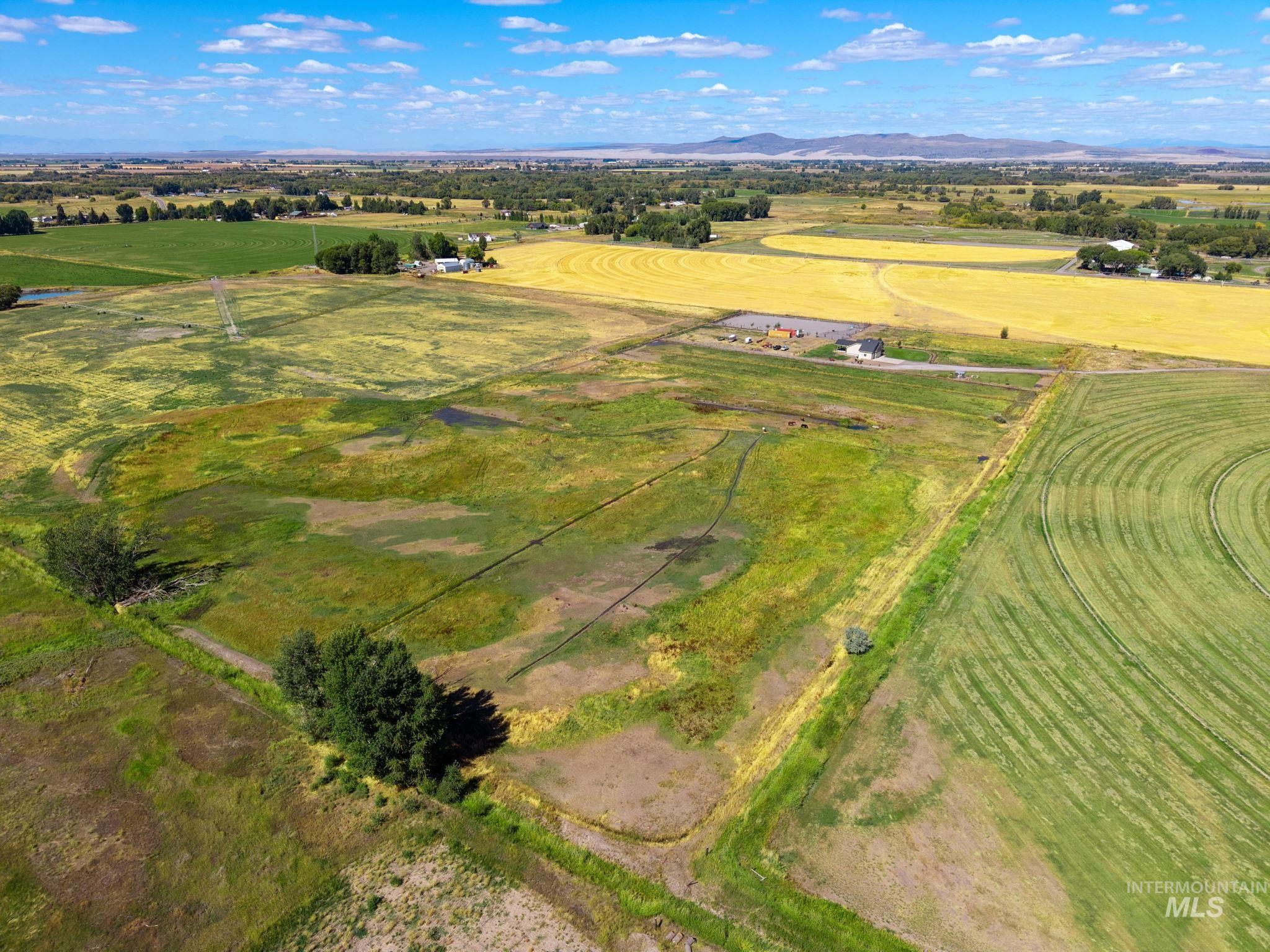 3625 North 2000 West Rexburg, ID 83440 - Photo 43 of 50 Overview of rural landscape featuring a mountainous background