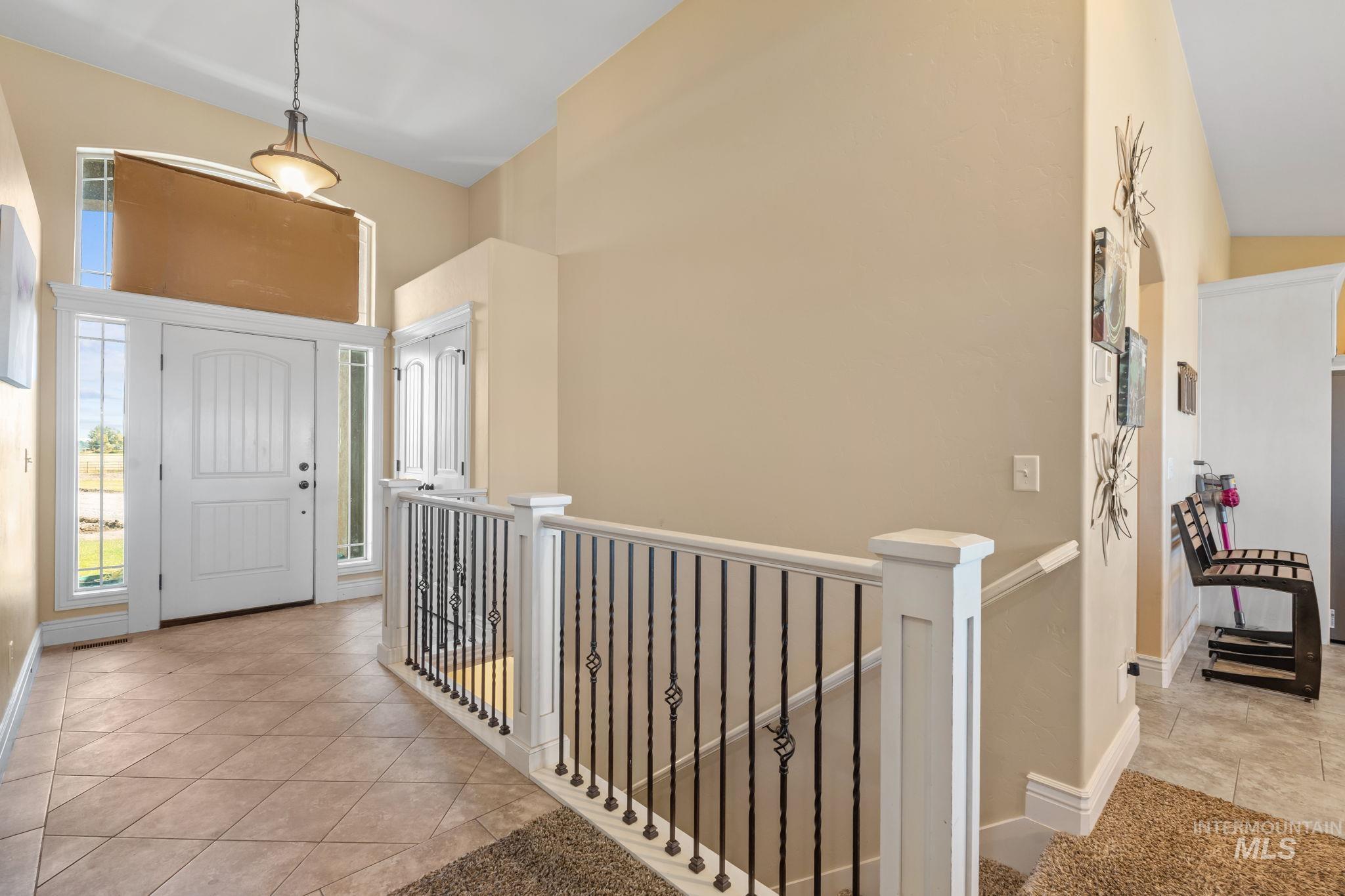3625 North 2000 West Rexburg, ID 83440 - Photo 46 of 50 Entryway with light tile patterned flooring and baseboards