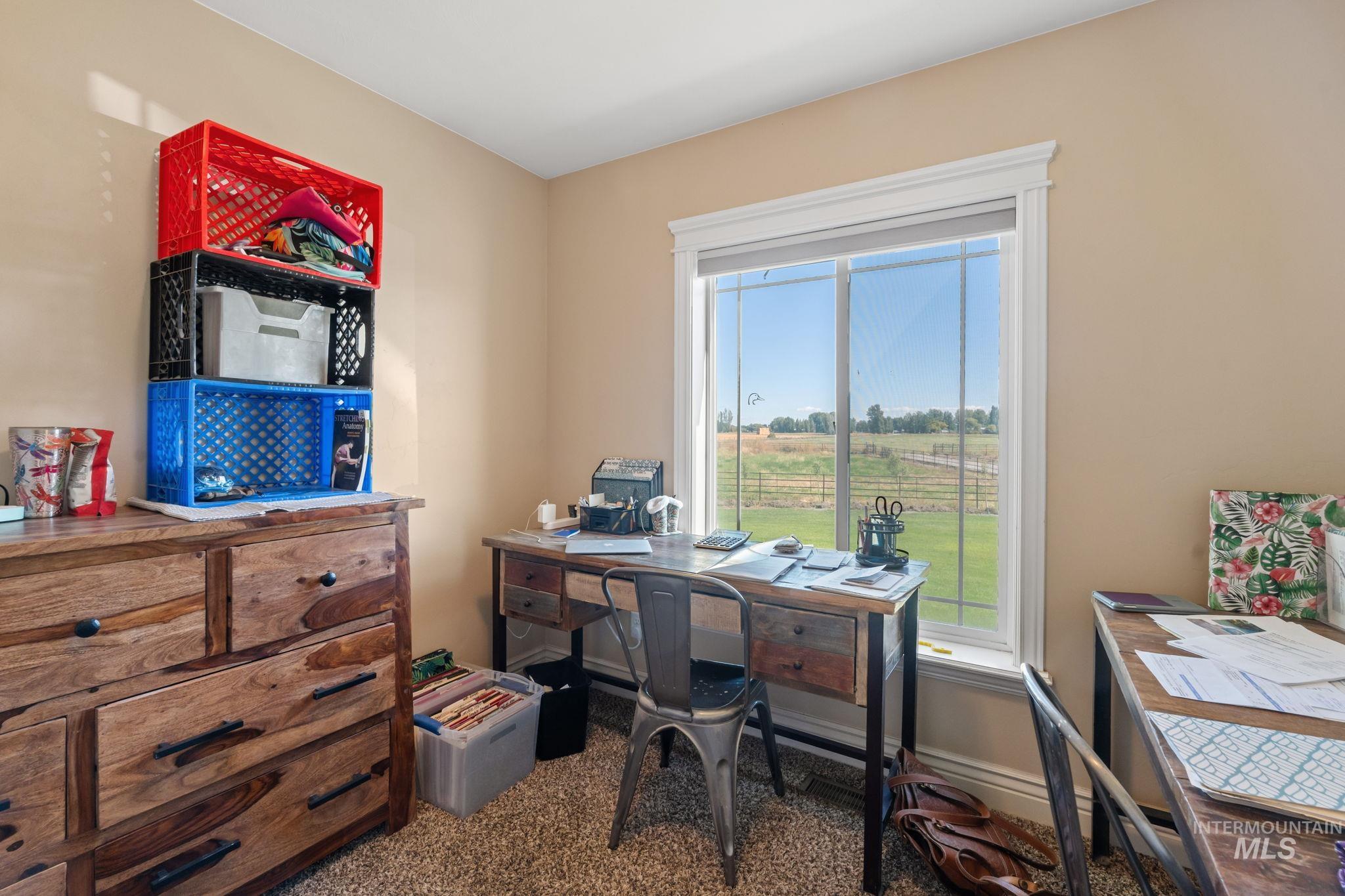 3625 North 2000 West Rexburg, ID 83440 - Photo 8 of 50 Office with dark carpet and baseboards