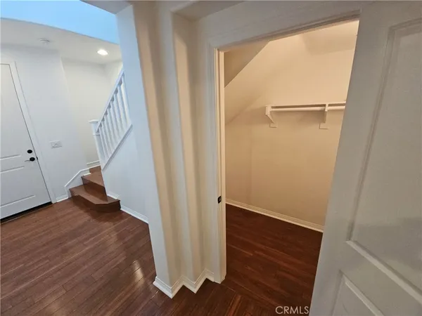 a view of entryway with wooden floor