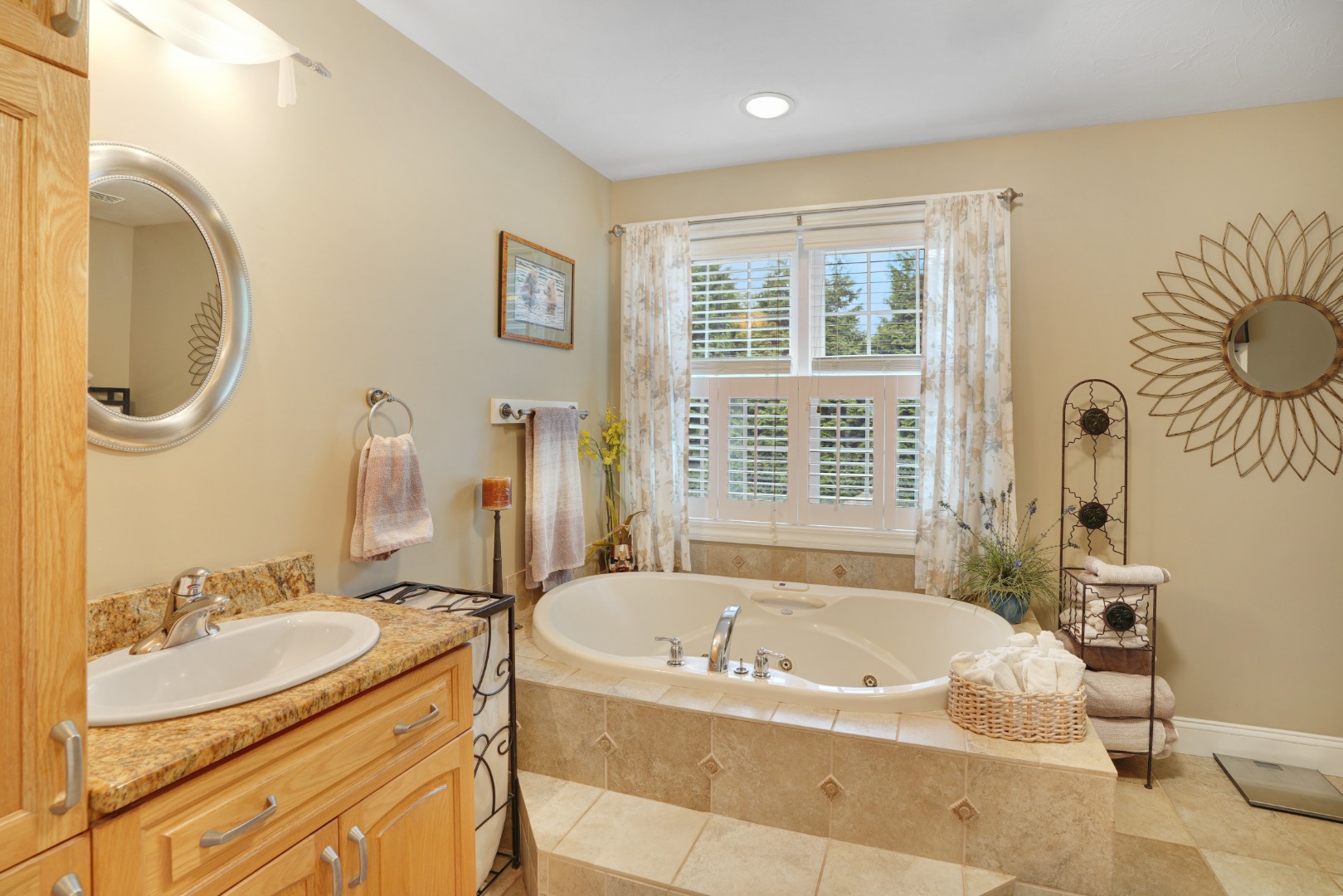 8 Fresh Pond Road Oak Bluffs, MA 02557 - Photo 12 of 36 a bath tub sitting next to a bathroom sink