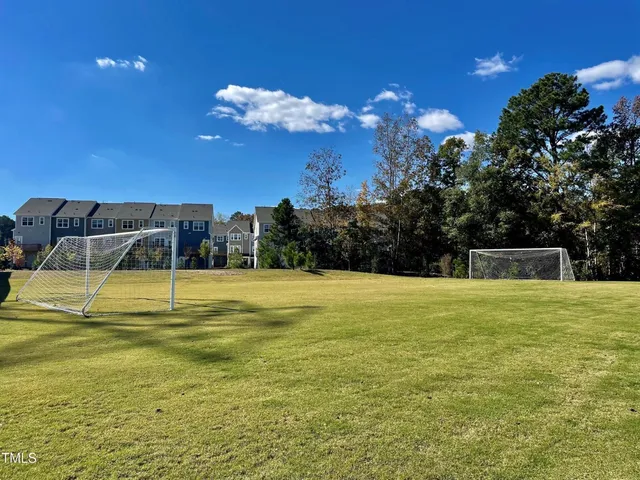a picture of a bench in front of a wall