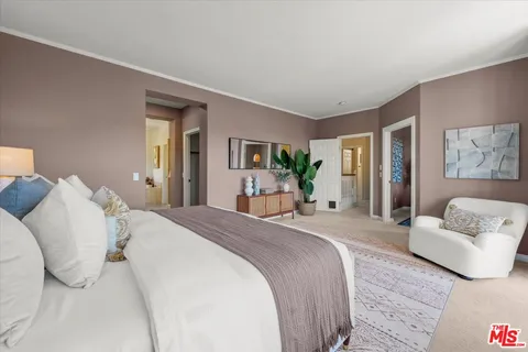 a bathroom with a granite countertop sink a toilet tub and shower