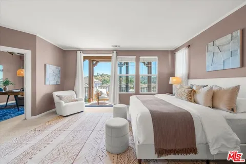 a spacious bathroom with a bathtub shower and toilet