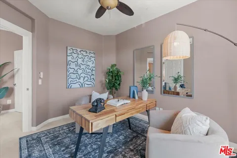 a bathroom with a sink a vanity and a mirror