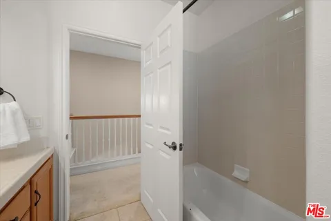 a view of a house with a street