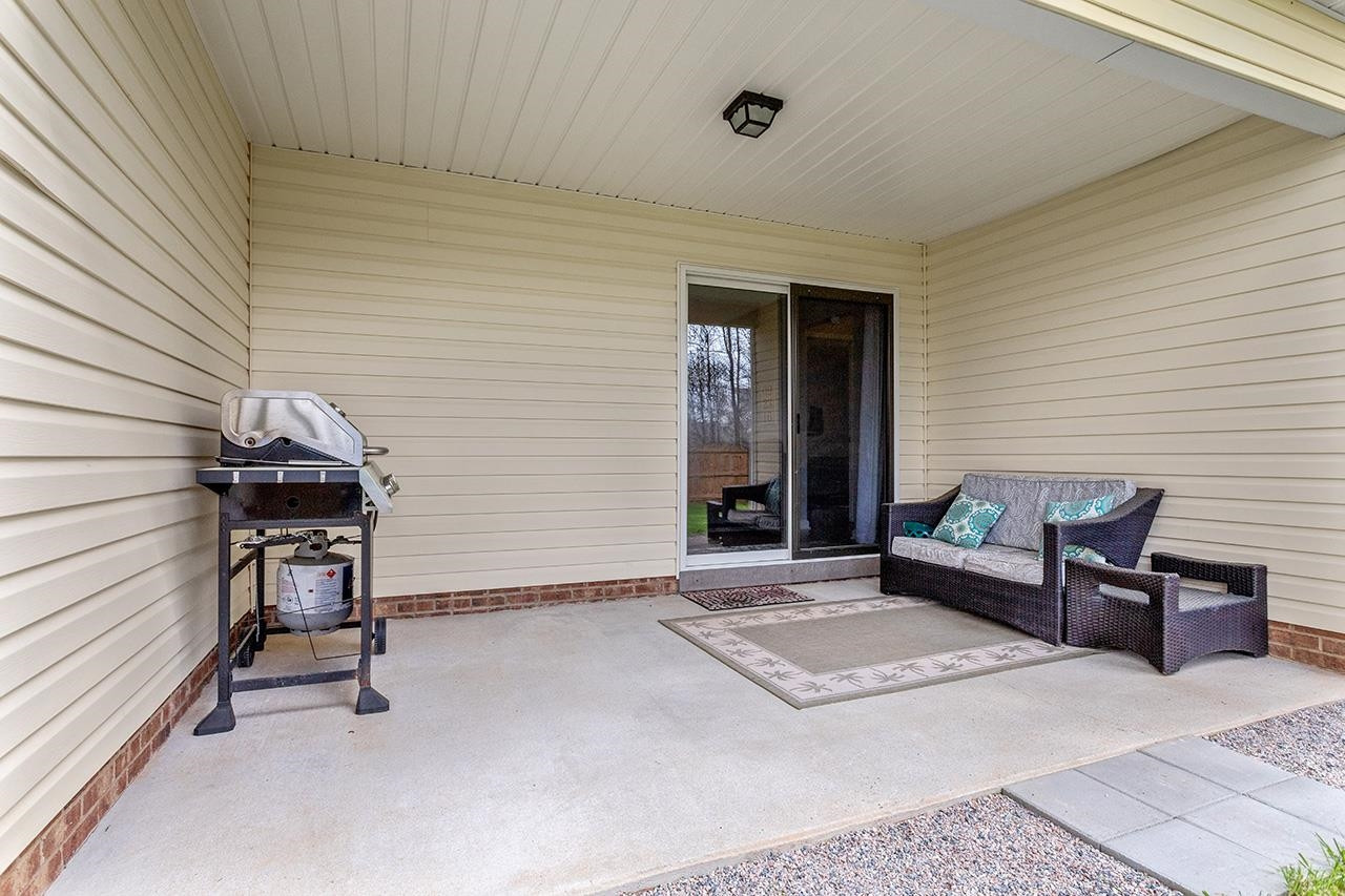 3824 Chokecherry Lane Raleigh, NC 27616 - Photo 28 of 32 Rear Covered Porch