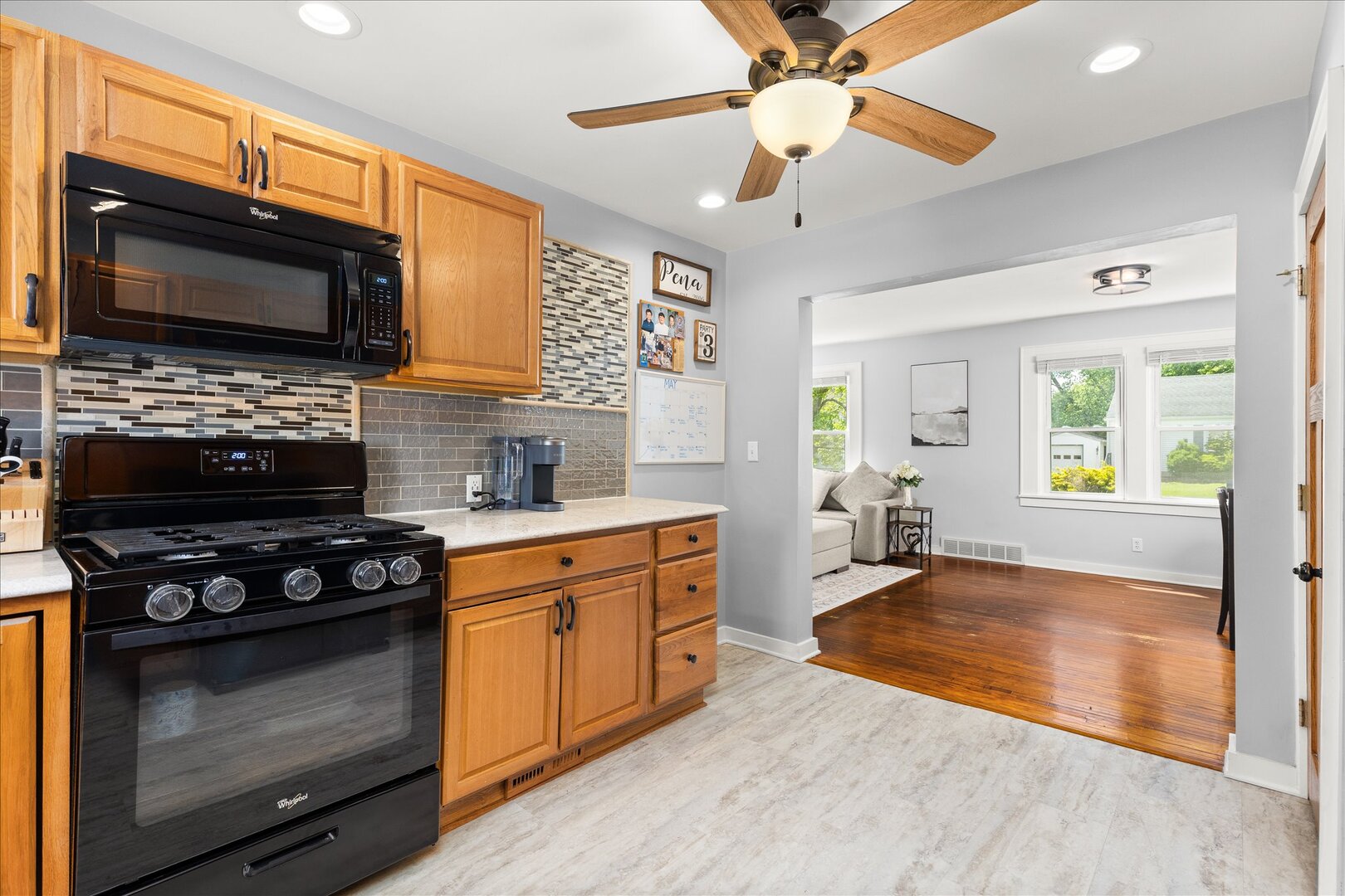 742 Chambers Street Ottawa, IL 61350 - Photo 18 of 39 a kitchen with stainless steel appliances granite countertop a stove microwave and sink