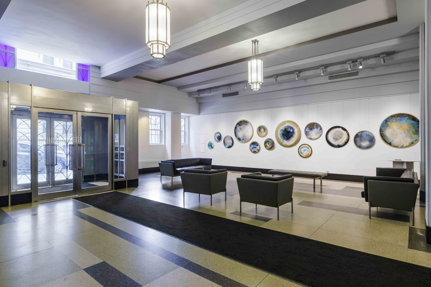 310 Riverside Drive, Unit 511 Manhattan, NY 10025 - Photo 10 of 11 a view of a lobby with furniture and wooden floor