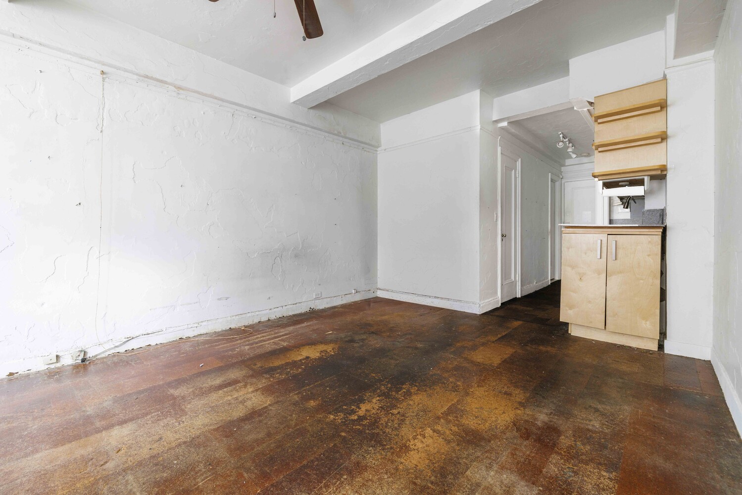 310 Riverside Drive, Unit 511 Manhattan, NY 10025 - Photo 4 of 11 an empty room with windows