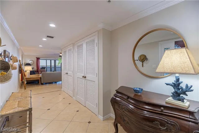 a view of living room with furniture and a window