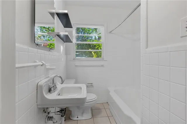 a bathroom with a sink and a bathtub