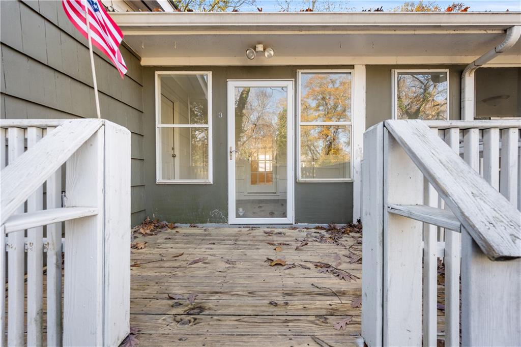 56 Mobile Avenue Northeast, Unit B Atlanta, GA 30305 - Photo 20 of 21 a front view of a house with a yard
