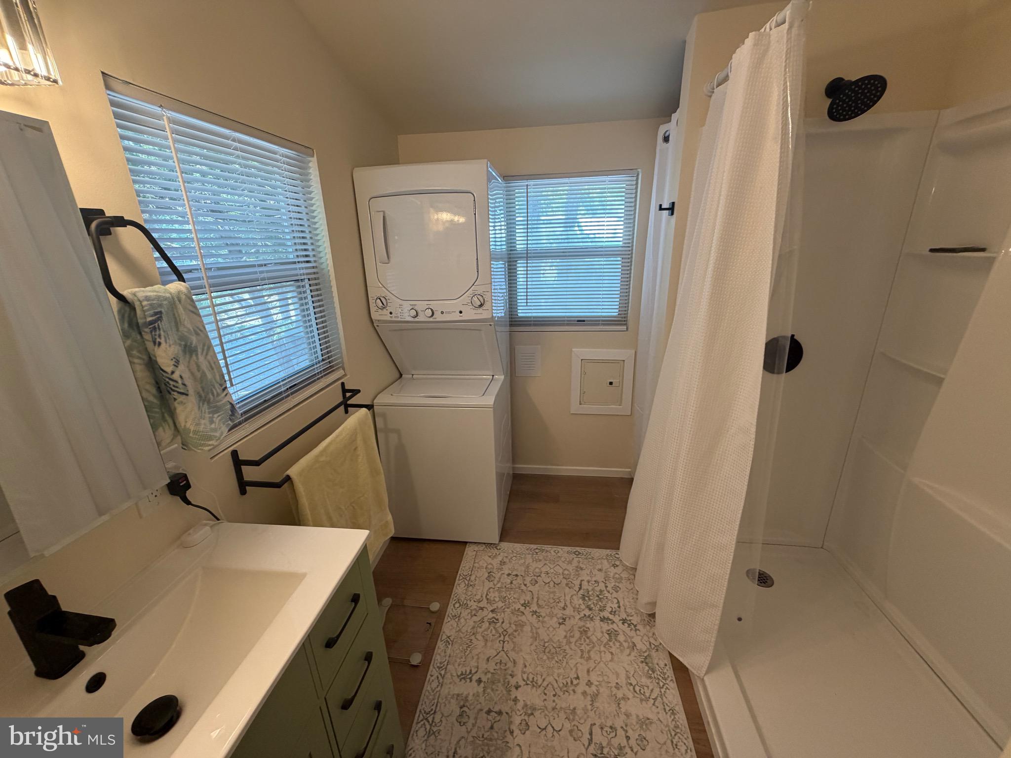 515 Corsons Tavern Road, Unit B17 Ocean View, NJ 08230 - Photo 17 of 26 second bathroom w/ w/d unit