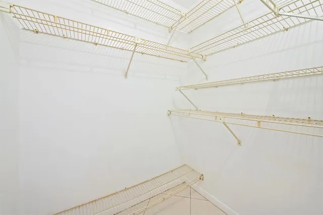 a view of a room with racks on the wall