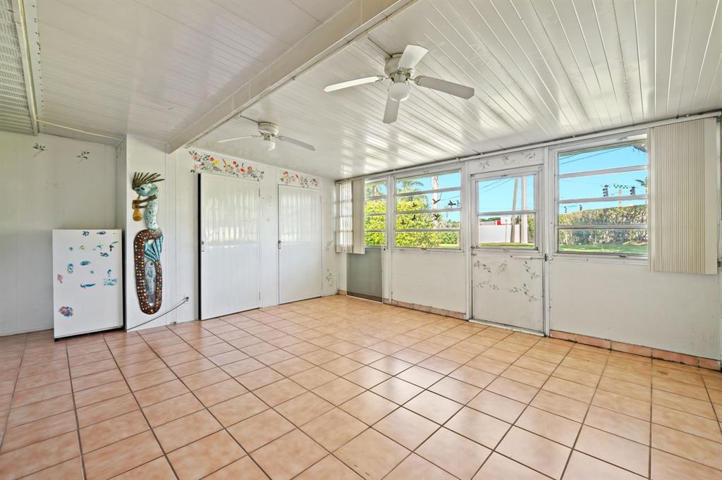 1271 Northwest 18th Avenue, Unit 5C Delray Beach, FL 33445 - Photo 24 of 36 a view of a livingroom with an entryway