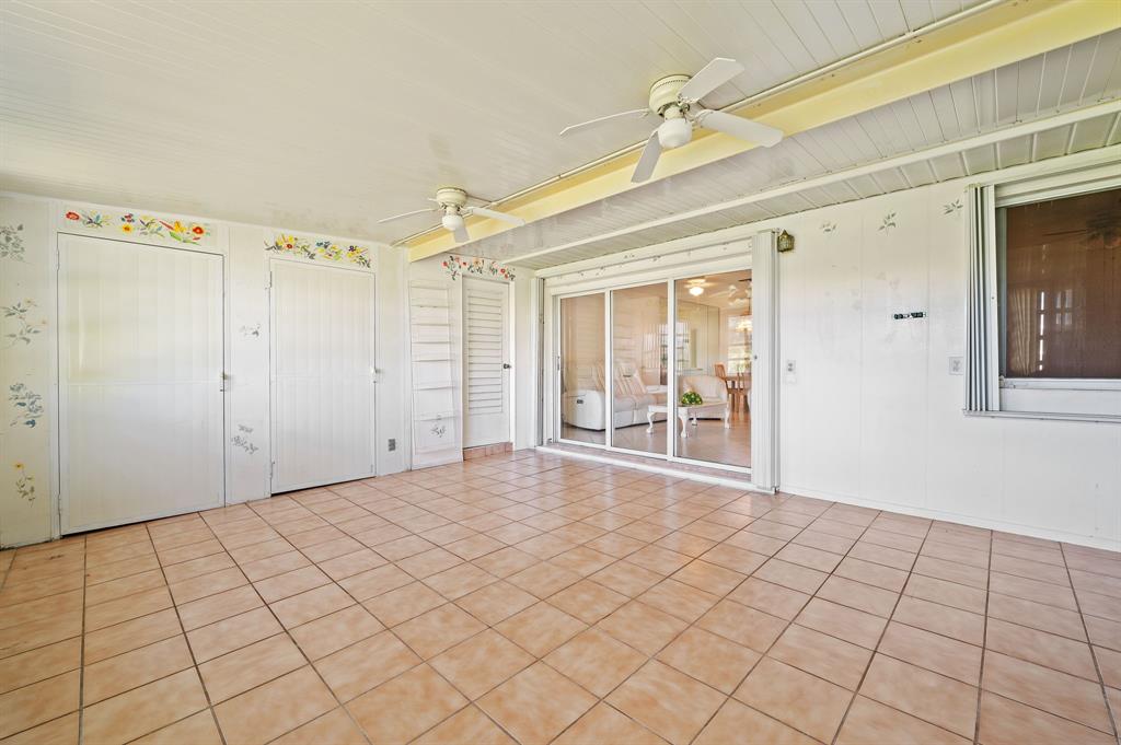 1271 Northwest 18th Avenue, Unit 5C Delray Beach, FL 33445 - Photo 25 of 36 a view of an empty room