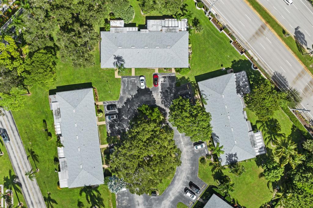1271 Northwest 18th Avenue, Unit 5C Delray Beach, FL 33445 - Photo 28 of 36 an aerial view of a house