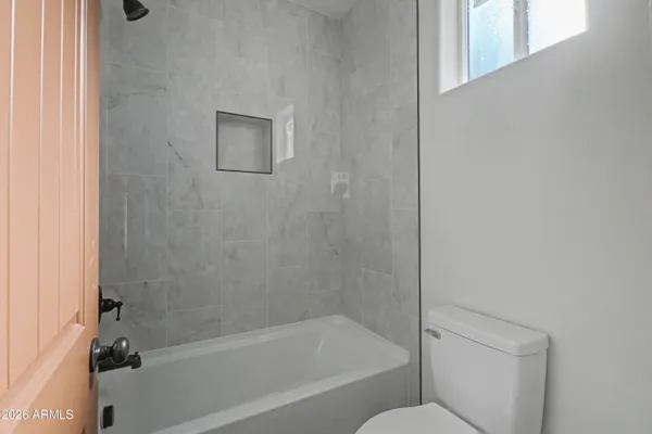 a view of a room with rack on the wall
