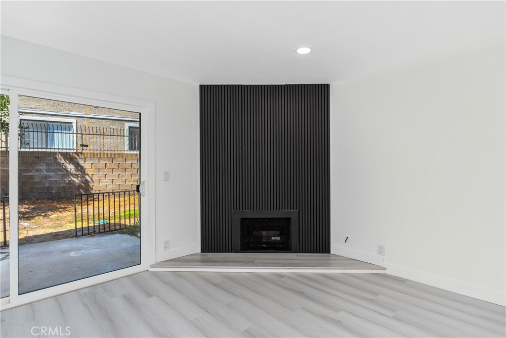 936 Fairway, Unit 8 Grand Terrace, CA 92324 - Photo 14 of 26 a view of an empty room with a window